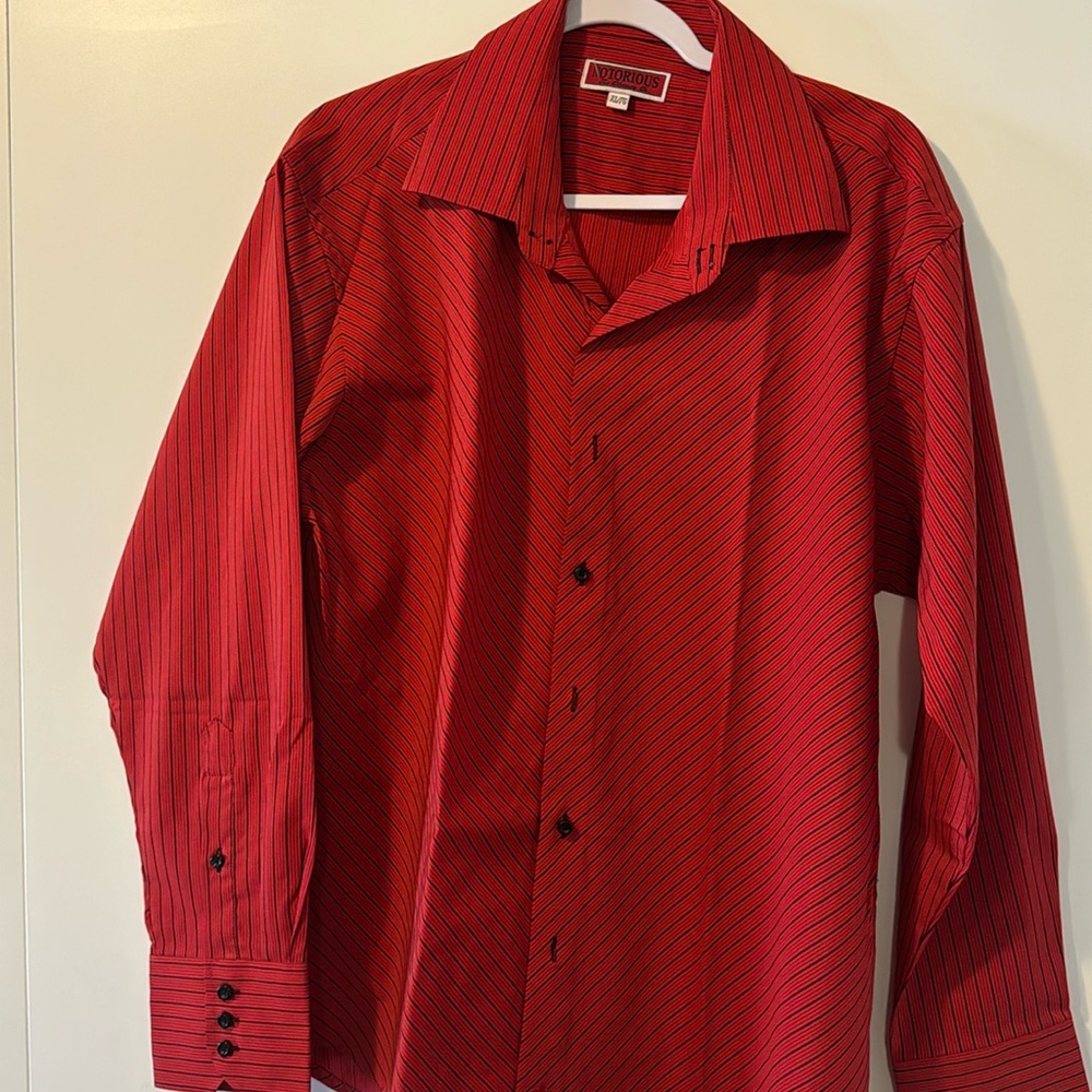 Notorious stripped Red long sleeve shirt.